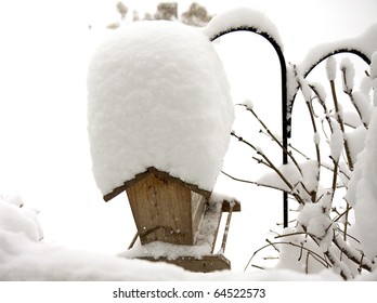 Birdhouse Covered High With Snow After Severe Winter Storm