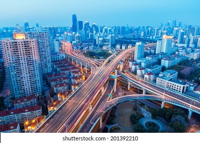 A Bird's Eye View Of Beautiful City Interchange In Nightfall 