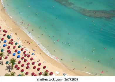A Birds Eye View Of Holiday Makers On A Resort Beach