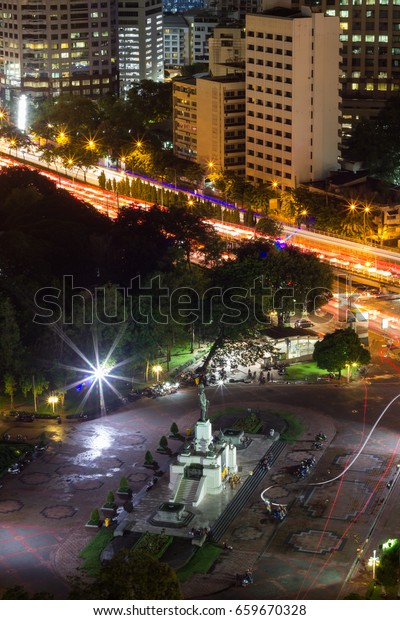 Bird\'s Eye View of King Rama VI Monument at the\
gate to Lumpini Park,Rama IV\
Road,Lumphini,Pathumwan,Bangkok,Thailand at\
night.