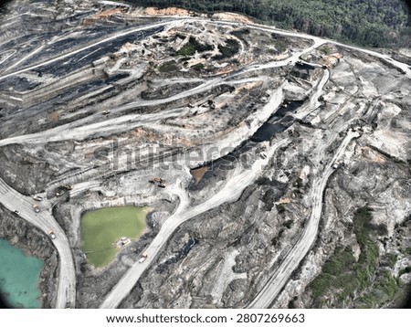 Birds Eye View of Massive Open Pit Coal Mining Site Overburden Removal