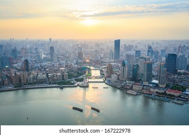 A Bird's Eye View Of Shanghai And Huangpu River In Sunset 