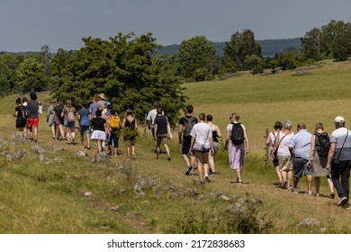 Birka, Sweden June 27, 2022 A Group Of Tourists On A Guided Tour Of The Old Viking Village.