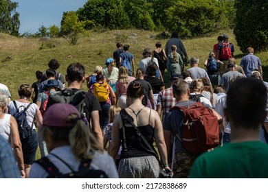 Birka, Sweden June 27, 2022 A Group Of Tourists On A Guided Tour Of The Old Viking Village.