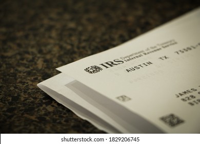 Birmingham, AL / USA - October 7, 2020: Opened Letter From The IRS Showing The Logo On The Corner Of The Paper With Selective Focus