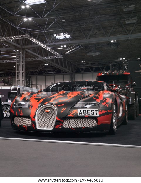 Birmingham, England - January 2020:\
camouflage wrapped Bugatti Veyron 16.4 attending annual Autosport\
International car show held at NEC\
Birmingham.