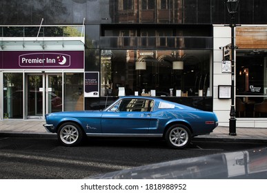 Birmingham, England - May 2018: Blue Ford Mustang Classic Muscle Car Parked Near A Hotel In Central Birmingham.