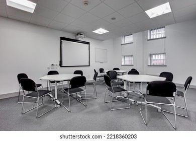 Birmingham, England - November 2 2011: Bright Furnished Empty Open Plan Meeting Room With Desks And Chairs