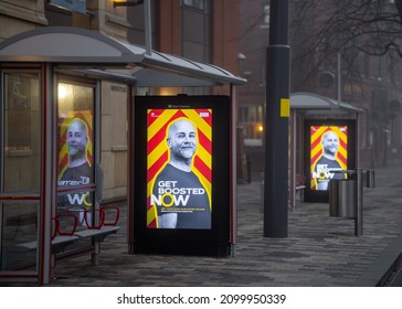 Birmingham, UK 1.1.2022 Covid 19 Booster Jab Government Advertisement On City High Street. Vaccine Billboard Advertising To Get Third Vaccination Injection To Protect NHS Against Omicron Variant.