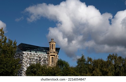 BIRMINGHAM, UK - 2022: Birmingham UK Street Scene With The Cube And Old Church Tower