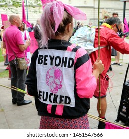 Birmingham, UK - July 13th 2019: Extinction Rebellion Protest Against Fast Fashion. Fashion Show Outside Primark