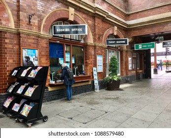 Birmingham, UK: May 02, 2018: A Passenger Buys A Ticket At Moor Street Railway Station. The Station Is Managed By Chiltern Railways. 