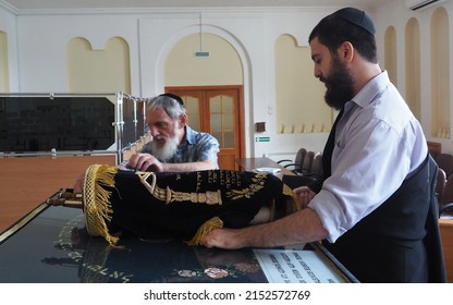  Birobidzhan, Jewish Autonomous Region,  Russia-08-15-2021:  Synagogue, Rabbi With Torah  In Velvet Case