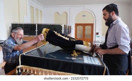  Birobidzhan, Jewish Autonomous Region,  Russia-08-15-2021:  Synagogue, Rabbi With Torah  In Velvet Case