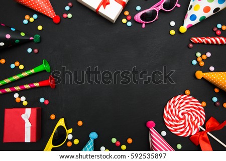 birthday black background with sweets and decorations
