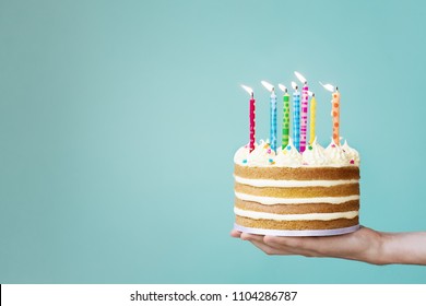 Birthday Cake With Buttercream And Colorful Candles