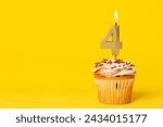 Birthday Cake With Candle Number 4 - Photo On Yellow Background.