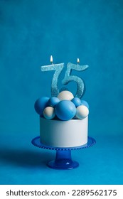 Birthday cake with candles in the form of the number 75 In blue and white colors, Concept of the Israeli holiday Independence Day - Shutterstock ID 2289562175