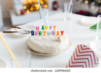 Birthday Cake With Candles Near Glasses On Table At Home