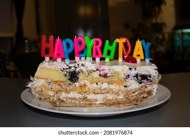 Birthday Cake With Candles On The Table. Happy Birthday.