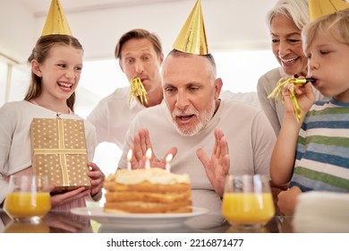 Birthday Cake, Celebration And Grandfather With Family Children Singing, Excited And Celebrate Together. Elderly, Senior Man With Kids, Gift Box Present For Fathers Day, Retirement Or Birthday Party