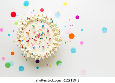 Birthday cake with colorful candles - Shutterstock ID 612911042