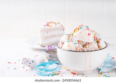 Birthday cake ice cream. Bowl portion of birthday cake taste white vanilla ice cream with colorful sugar sprinkles, funfetti with happy birthday decorations on table, copy space