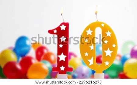 Birthday candle burning on white background, colorful number 10, 10th birthday i on white background with colorful balloons festive, party candles, Happy Brithday celebration