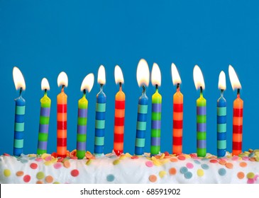 Birthday candles on blue background
