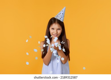 Birthday Child Girl Blowing Confetti Off Her Hands