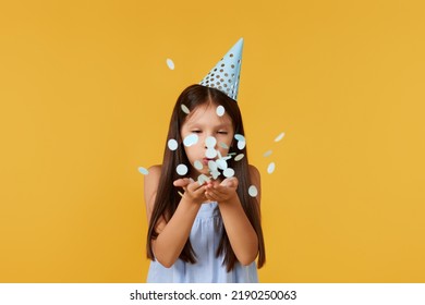 Birthday Child Girl Blowing Confetti Off Her Hands