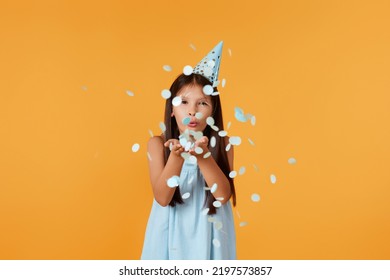 Birthday Child Girl Blowing Confetti Off Her Hands