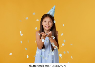 Birthday Child Girl Blowing Confetti Off Her Hands