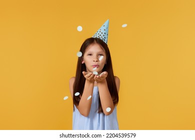 Birthday Child Girl Blowing Confetti Off Her Hands