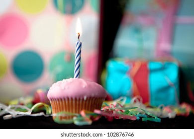 Birthday Cup Cake On A Black Table