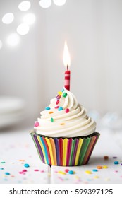 Birthday Cupcake With A Single Red Candle