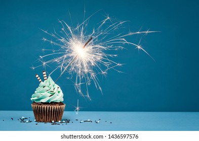 Birthday Cupcake Sparkler Sprinkles Over Blue Stock Photo (Edit Now ...