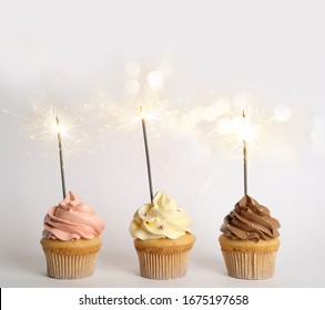 Birthday Cupcakes Sparklers On White Background Stock Photo 1675197658 ...