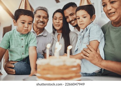 Birthday, family and children with parents and grandparents in a kitchen for cake, celebration and bonding. Party and kids with mother and father, happy and smile with grandmother and grandpa - Shutterstock ID 2266047949