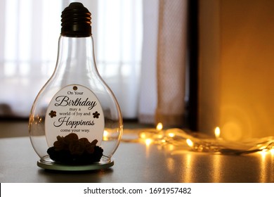 Birthday Gift - Glass Bulb With Happy Birthday Written Inside And Serial Light Backdrop