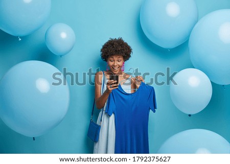 Similar – the blue dress of the anemone