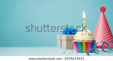 Birthday party background with cupcake, party hat and present