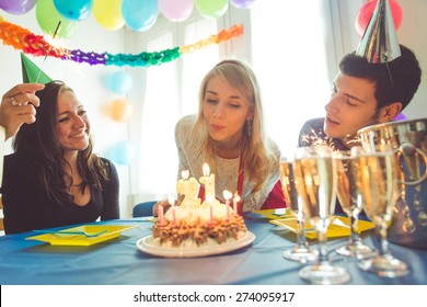 Birthday Party At Home. Three Friends Celebrating The Girl Birthday With Surprise Party At Home. Concept About Birthday, Party And People