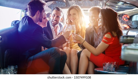 Birthday Party In A Limo With Glasses Of Champagne