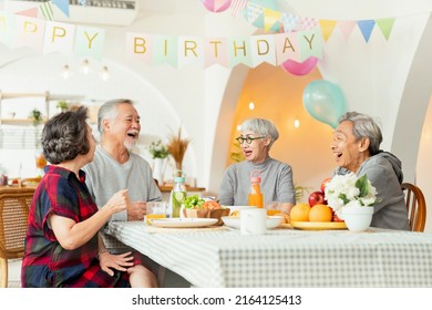 birthday party at senior daycare,group of asian female elder male female laugh smile positive conversation greeting in birthday friend party at nursing home senior daycare center Senior woman birthday - Powered by Shutterstock