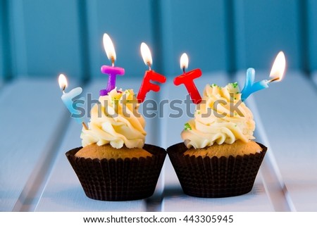 Birthday's cake - cupcake with a candles for 50 - fiftieth birthday . Happy birthday !