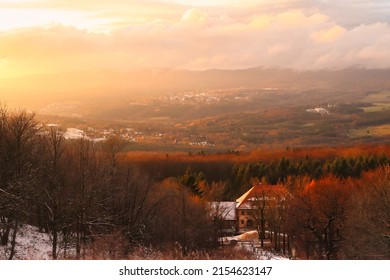 Bischofsheim, Germany - November 9, 2019: Beautiful light at sunset over the Rhon Mountains near Kreuzberg monastery in Bavaria, Germany on a fall afternoon.