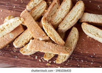 Biscotti on a wooden board, top view.