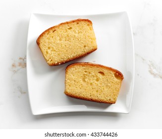 Biscuit Cake Slices On White Plate, Top View