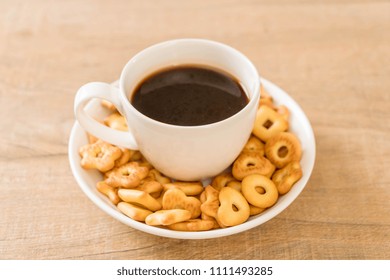 biscuits cracker with coffee on table